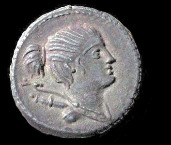AR denarius, C. Postumius 74 BC. Diana facing right, hair drawn back, tied in knot behind, bow, quiver at her shoulder.