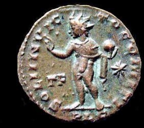 AE3 of Constantine the Great, reverse: radiate Sol holding globe.