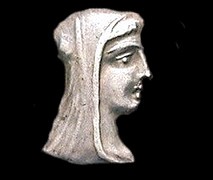 Veiled head of Vesta, appears on first century BC coins as obverse image.