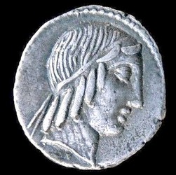Diademed head of Apollo, with fillet and hair in ringlets. AR denarius, Marcius Censorinus, c. 84 BC.
